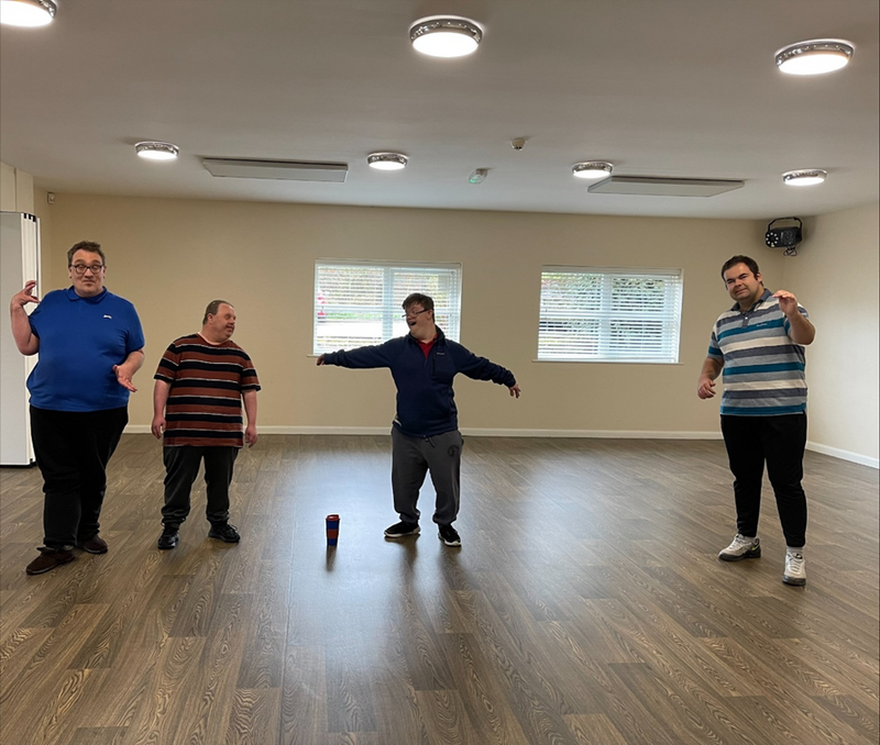 A group shot of dancers in a dance studio