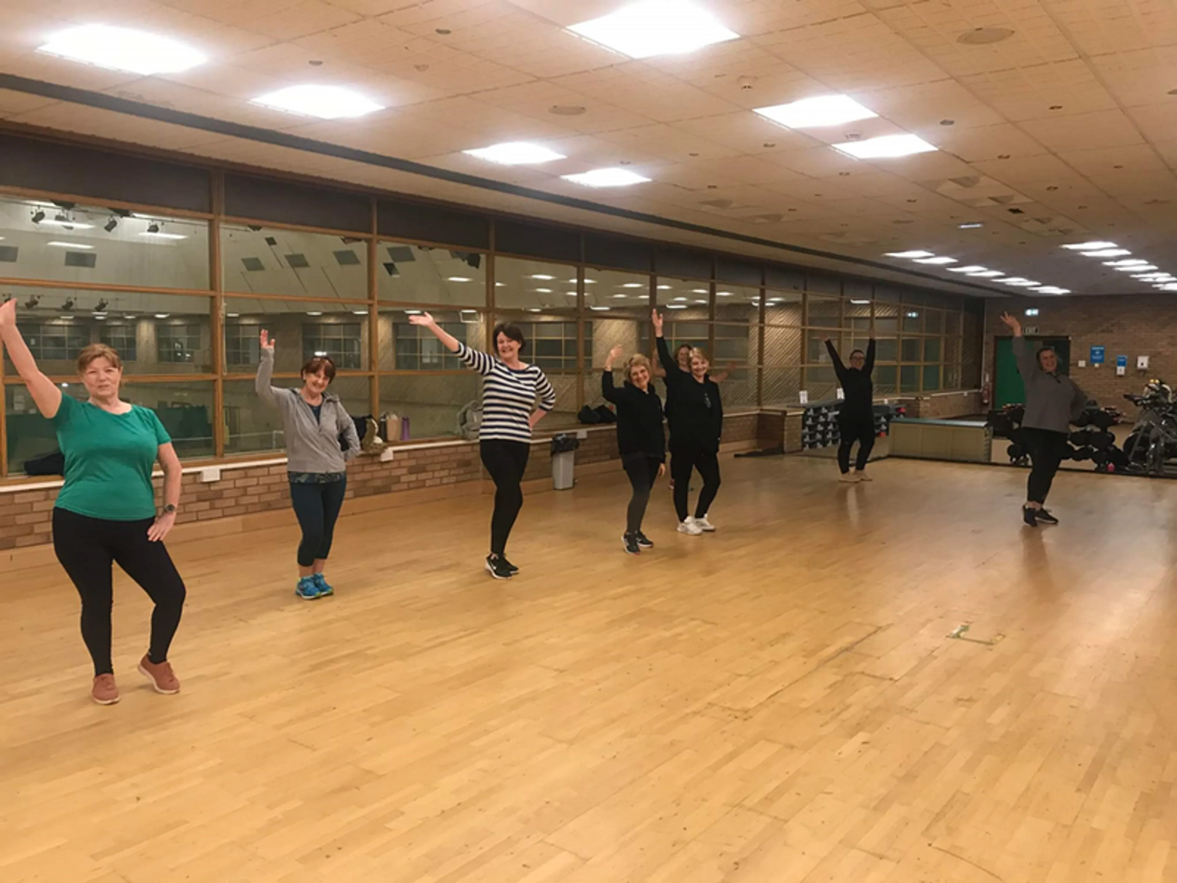 Dancers in front of a dance mirror